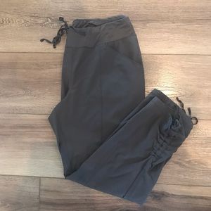 Crop pants with tie at waist and elastic cinching